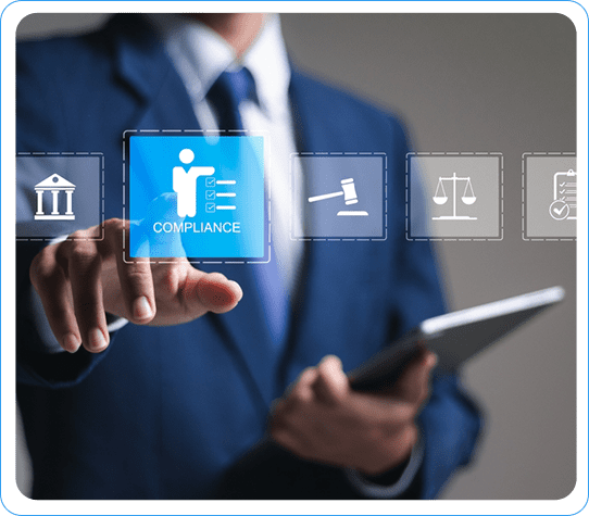 Hand interacting with a digital compliance icon, surrounded by law and regulation symbols, on a tablet.