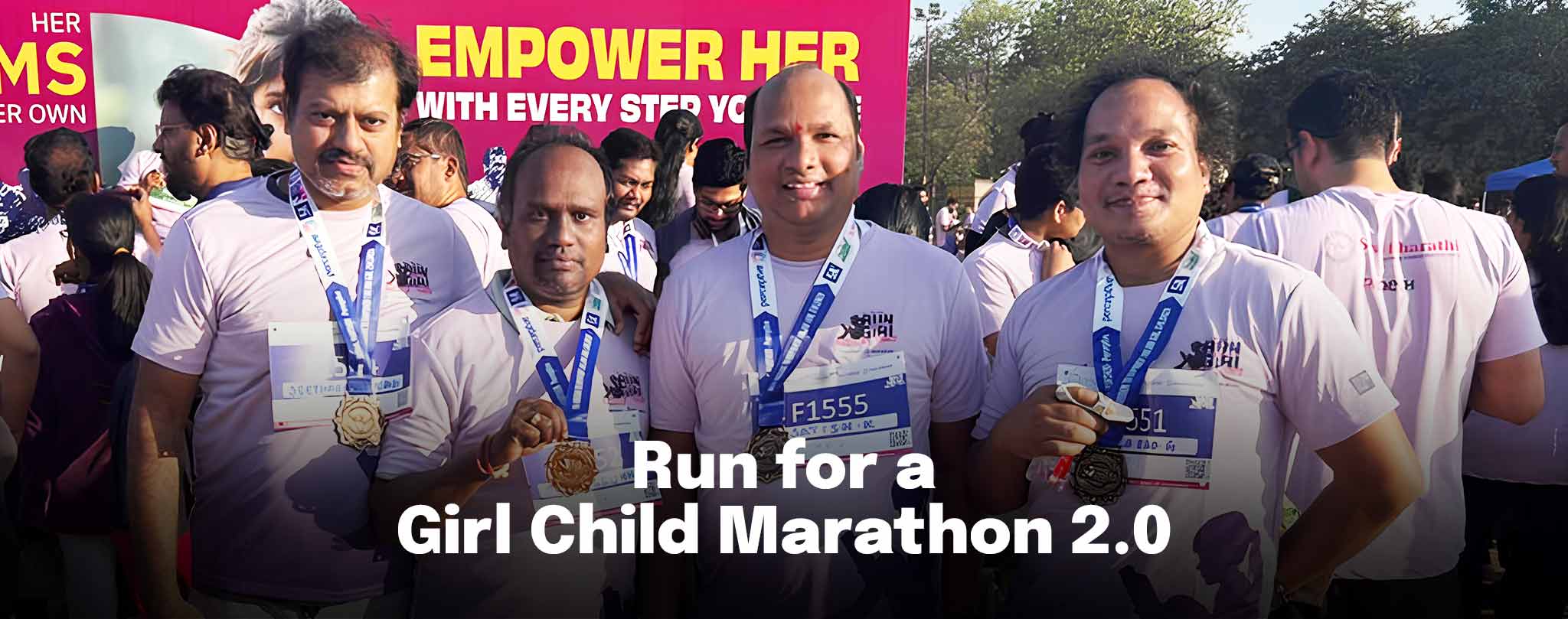 Vertex Run for a Girl Child Marathon 2.0 team with completion medals celebrating impact